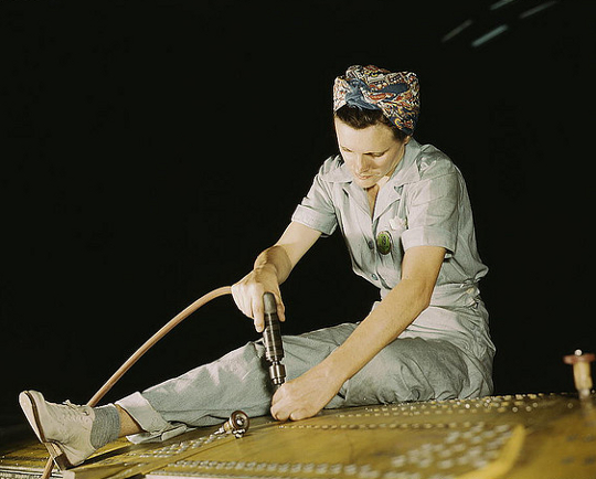 World War Two Fashion a women wears pants while working during the 1940s